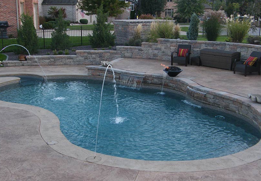 An outdoor in-ground custom pool